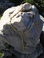 A rosary on a stone at Krizevac