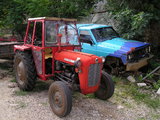 Tractor and a disabled vehicle in Medjugorje